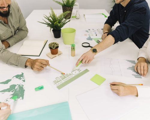 group-businesspeople-making-plans-energy-saving-workplace (1)